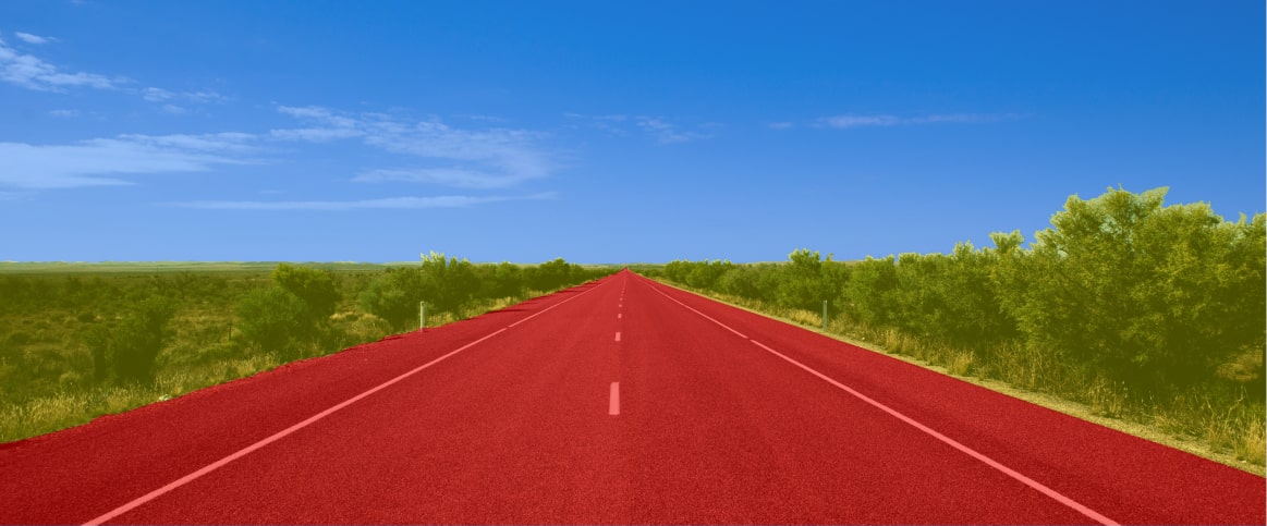 An example of annotated road segmentation image, where the road is processed via semantic segmentation